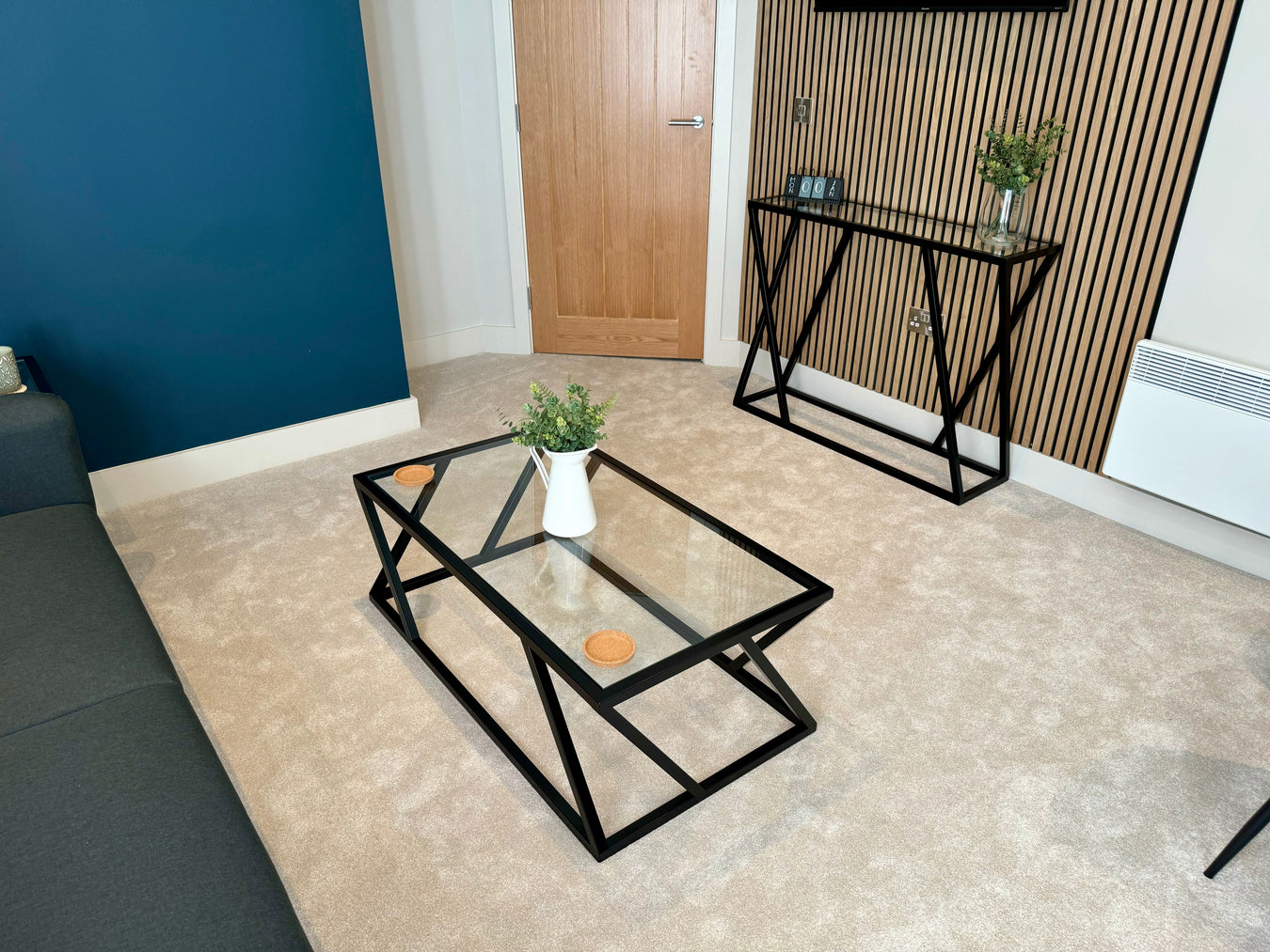 Twisted metal glass coffee table