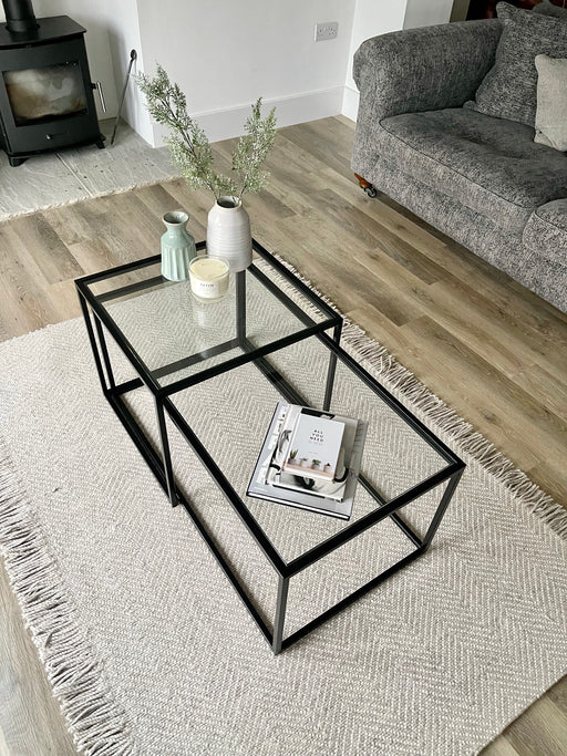 birds eye view of glass and metal nesting coffee tables