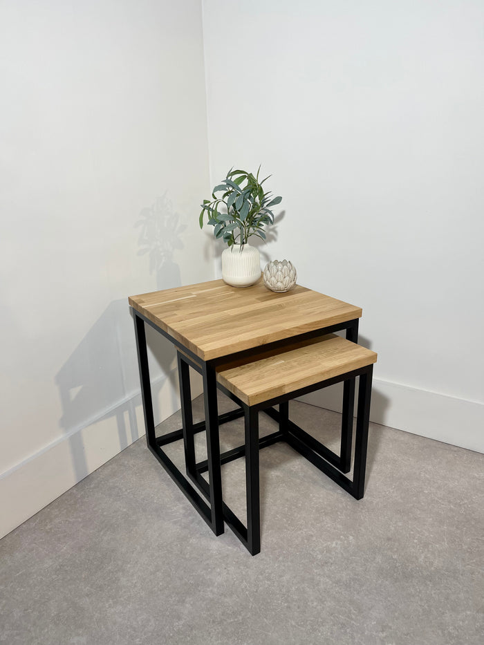 Wooden top and black metal leg nesting coffee tables
