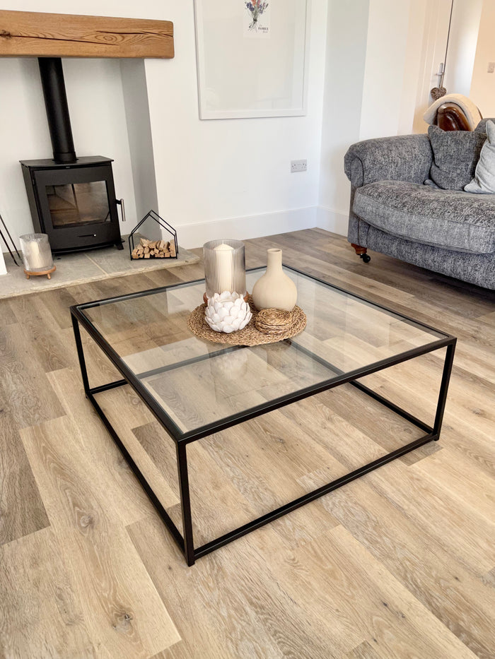 black frame coffee table with glass top