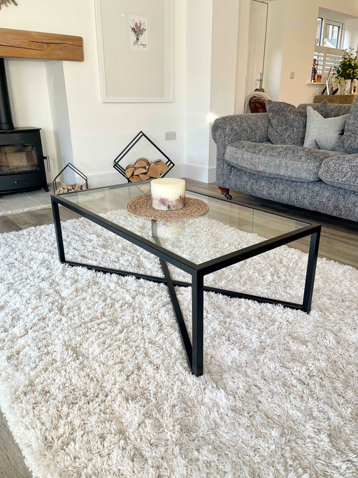 Glass and Black Metal Coffee Table